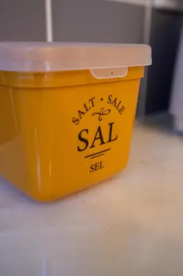 a yellow bucket with an art s sale sale sign on it at Ilha D’ouro House S. Vitor in Porto