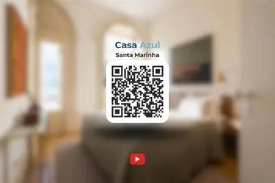 a iphone with a picture of a living room at Casa Azul Santa Marinha in Vila Nova de Gaia