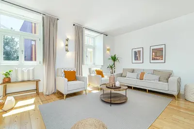 a living room with a couch and two chairs at Monte dos Judeus I by Innkeeper in Porto