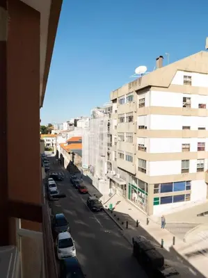a view of a city street from a building at APOSENTUS - Charming Torrinha in Porto