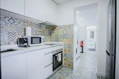 a small bedroom with a bed and a window at HEART OF THE CITY 1 ! in Vila Nova de Gaia