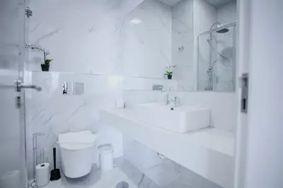 a white room with a bed and a hallway at HEART OF THE CITY 1 ! in Vila Nova de Gaia