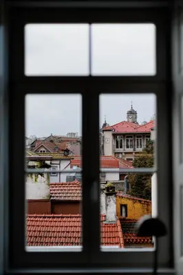 a view of a city from a window at Ribeira Charming Apartment in Porto
