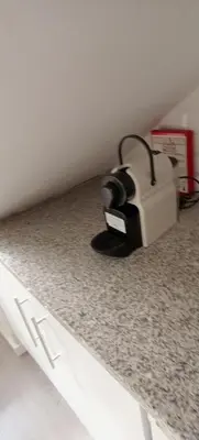 a toaster sitting on top of a kitchen counter at InLapa Studio V Porto Terrace in Porto