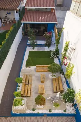 an aerial view of a garden with benches on a building at InLapa Studio V Porto Terrace in Porto