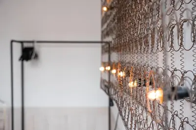 a wall with a bunch of lights on it at GuestReady - Cosy in the Historic Heart of Porto in Porto