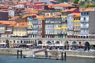 a group of buildings next to a body of water at Duke Street Guest House in Porto