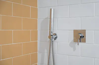 a shower with a shower head in a bathroom at Sunshine Luxury House Urban Retreat Downtown Porto in Porto