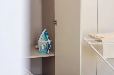 a room with a shelf with an open door at Mouzinho da Silveira 215 by LovelyStay in Porto