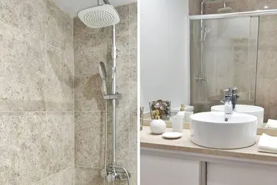 a bathroom with a sink and a shower at Two Bedroom Terrace Sanctuary in the Center in Porto