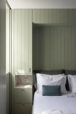 a bedroom with a white bed and a sink at ORM Portas Santa Catarina Apartments in Porto