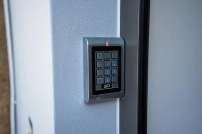 a remote control is attached to a door at Ilha Douro Duplex in Porto