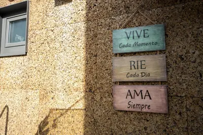 a building with signs on the side of it at Ilha Douro Duplex in Porto