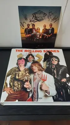 a book of the rocklingiants is on a shelf at Dream on - Clérigos Tower in Porto