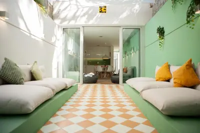 a living room with couches and a checkered floor at PORTO CONCEPT HOME - Campo Alegre in Porto
