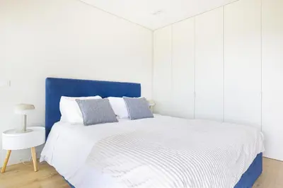 a room with a gym with exercise equipment on the floor at Dragão - Indigo Antas Park in Porto