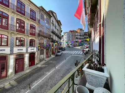 a view of a city street from a balcony at Historic Porto Balcony Hideaway - Taipas House 60 in Porto