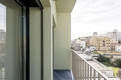 a balcony with a view of a city at Santos Pousada 1071 by LovelyStay in Porto